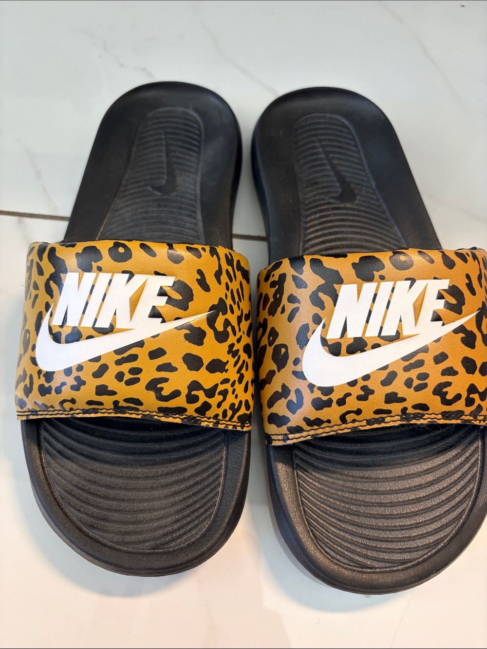 Nike women’s Leopard Print Slide Sandals - Black & Gold